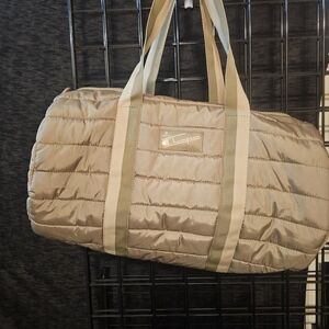 Champion Tan Quilted Duffel Bag